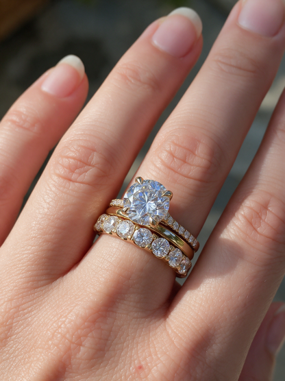 Woman wearing a stack of gold zirconia rings