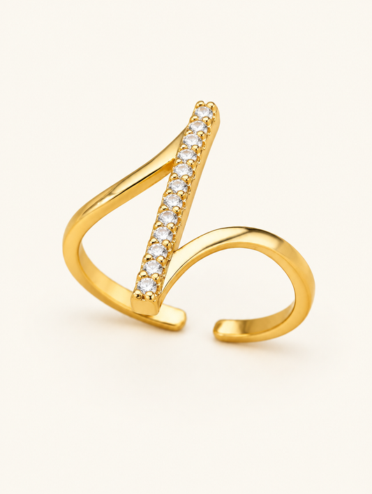 Gold bar zirconia wrap ring on a neutral background