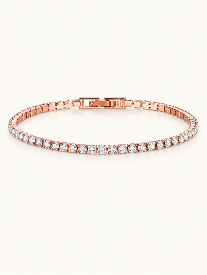 Rose gold zirconia tennis bracelet with a single row of clear stones on a neutral background