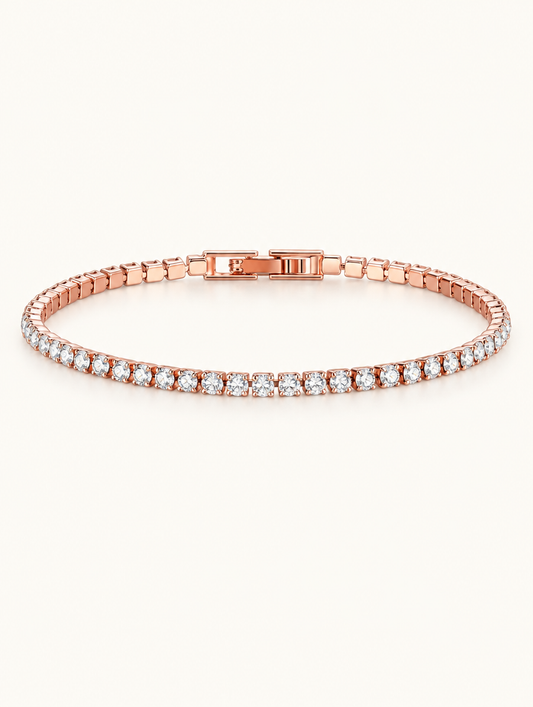 Rose gold zirconia tennis bracelet with a single row of clear stones on a neutral background