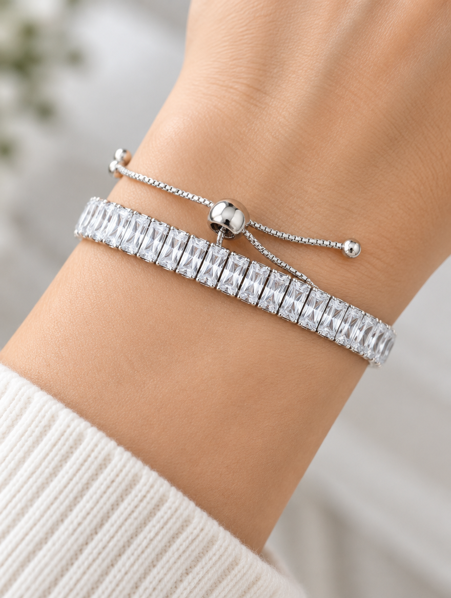 Woman wearing a silver baguette zirconia slider bracelet