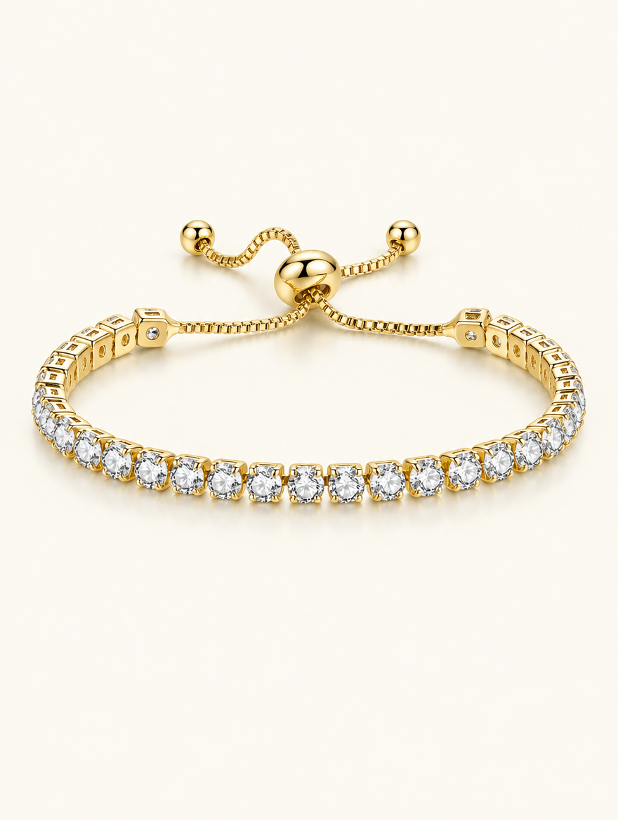 Gold round zirconia slider tennis bracelet on a neutral background
