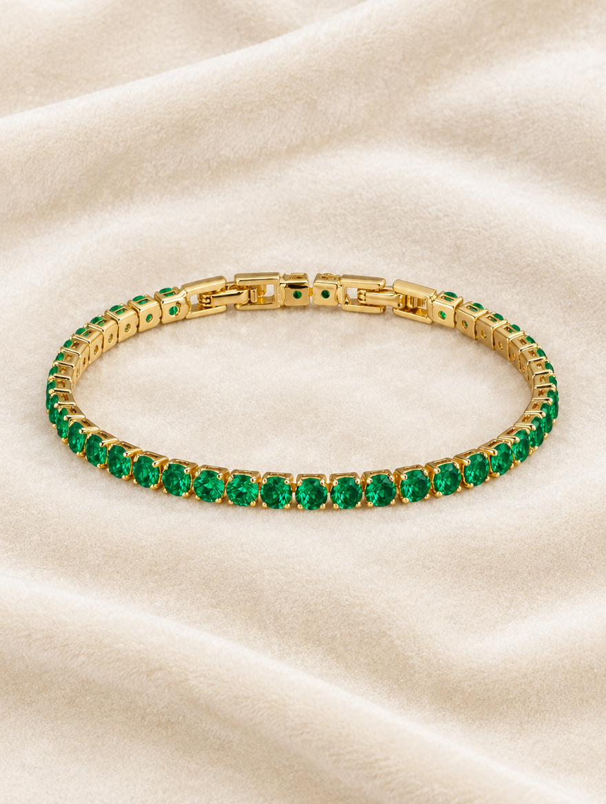 Gold green zirconia tennis bracelet on cream velvet