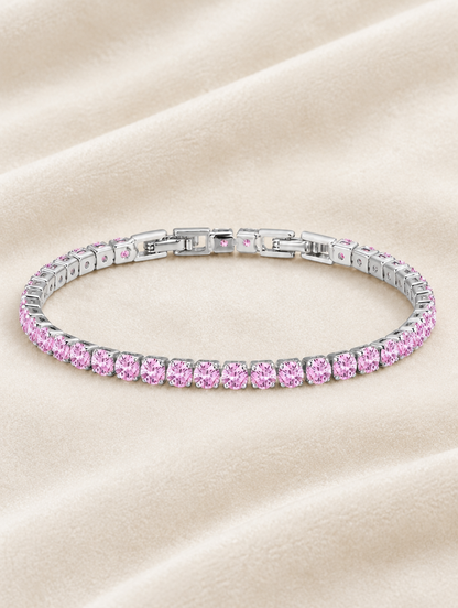 Silver pink zirconia tennis bracelet on cream velvet