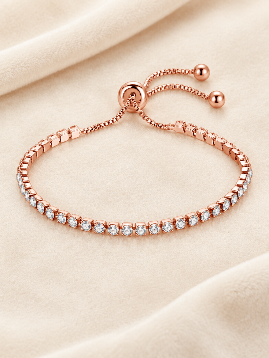 Rose gold zirconia slider bracelet on cream velvet