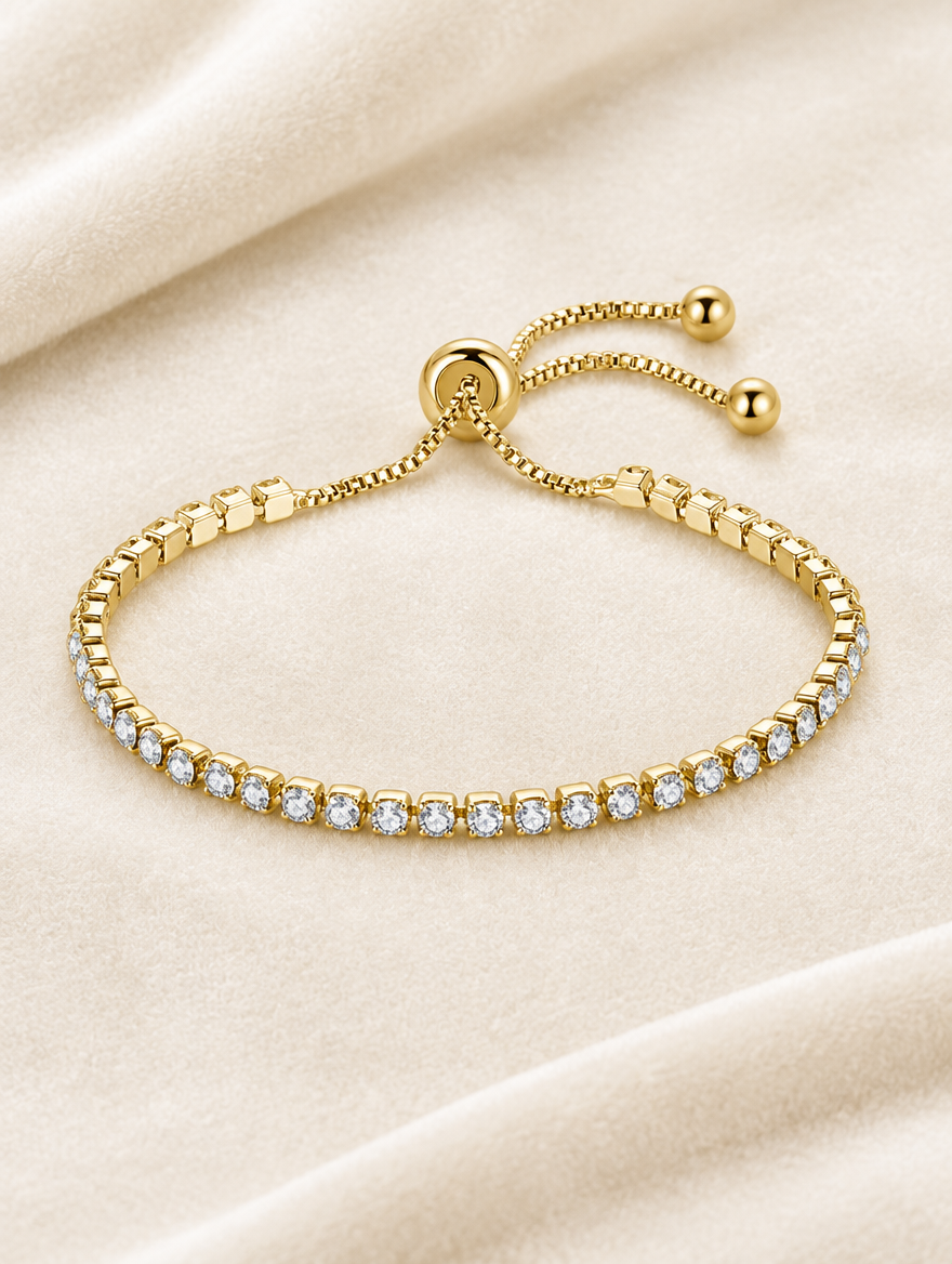 Gold zirconia slider bracelet on cream velvet