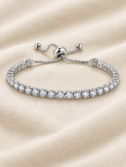 Silver zirconia slider bracelet on cream velvet