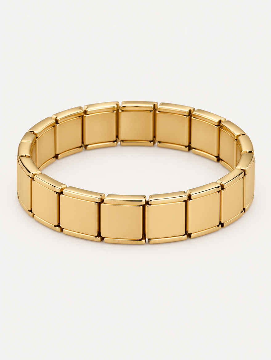 Gold-tone stainless steel stretch link bracelet on a neutral background