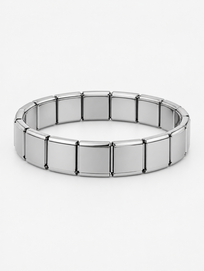 Silver stainless steel stretch link bracelet on a neutral background