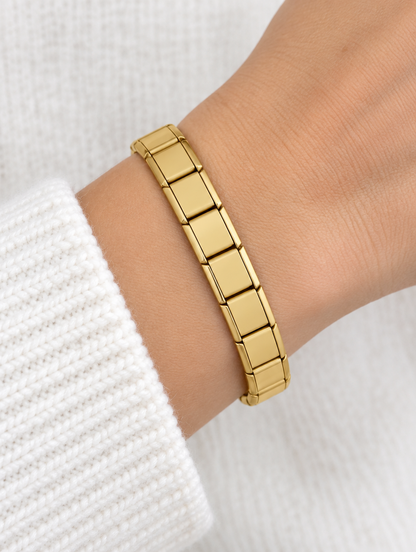 Woman wearing a gold-tone stainless steel link bracelet