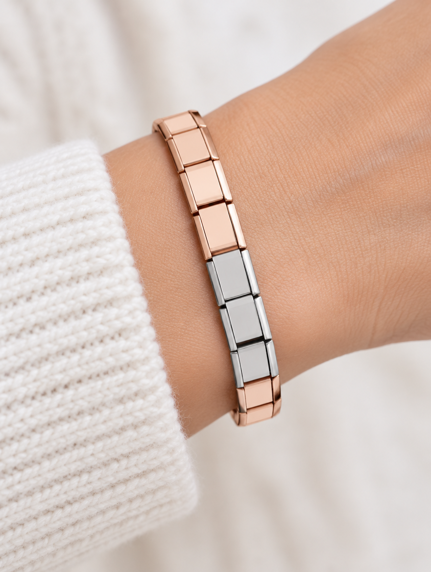 Woman wearing a rose gold and silver link bracelet