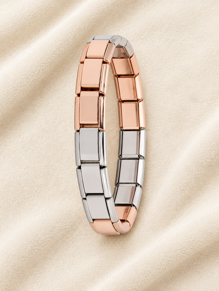 Rose gold and silver link stretch bracelet on cream velvet