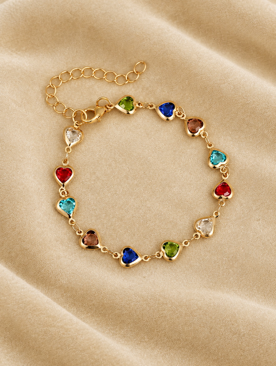 Gold multicolour crystal heart bracelet on cream velvet