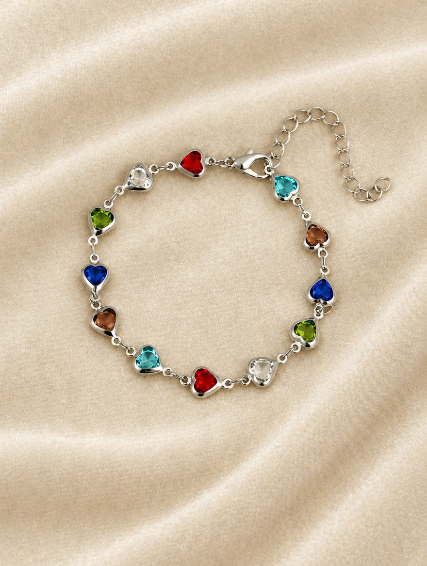 Silver multicolour crystal heart bracelet on cream velvet