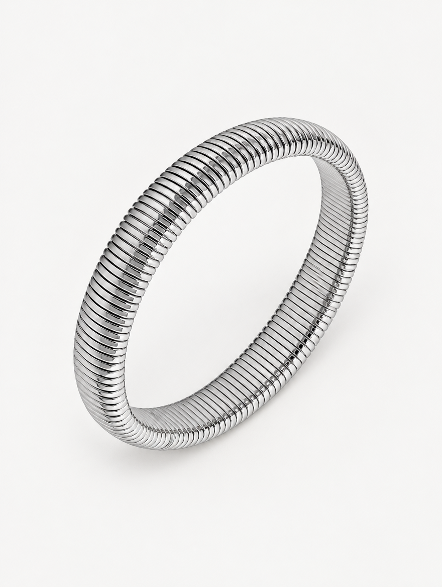 Silver wide ribbed stretch bracelet on a neutral background