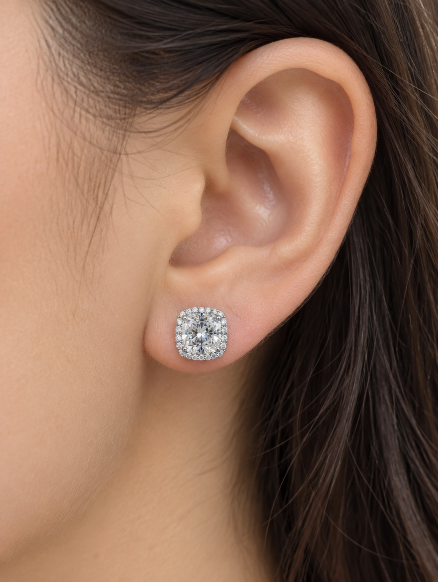 Woman wearing a white halo cushion-cut cz stud earring