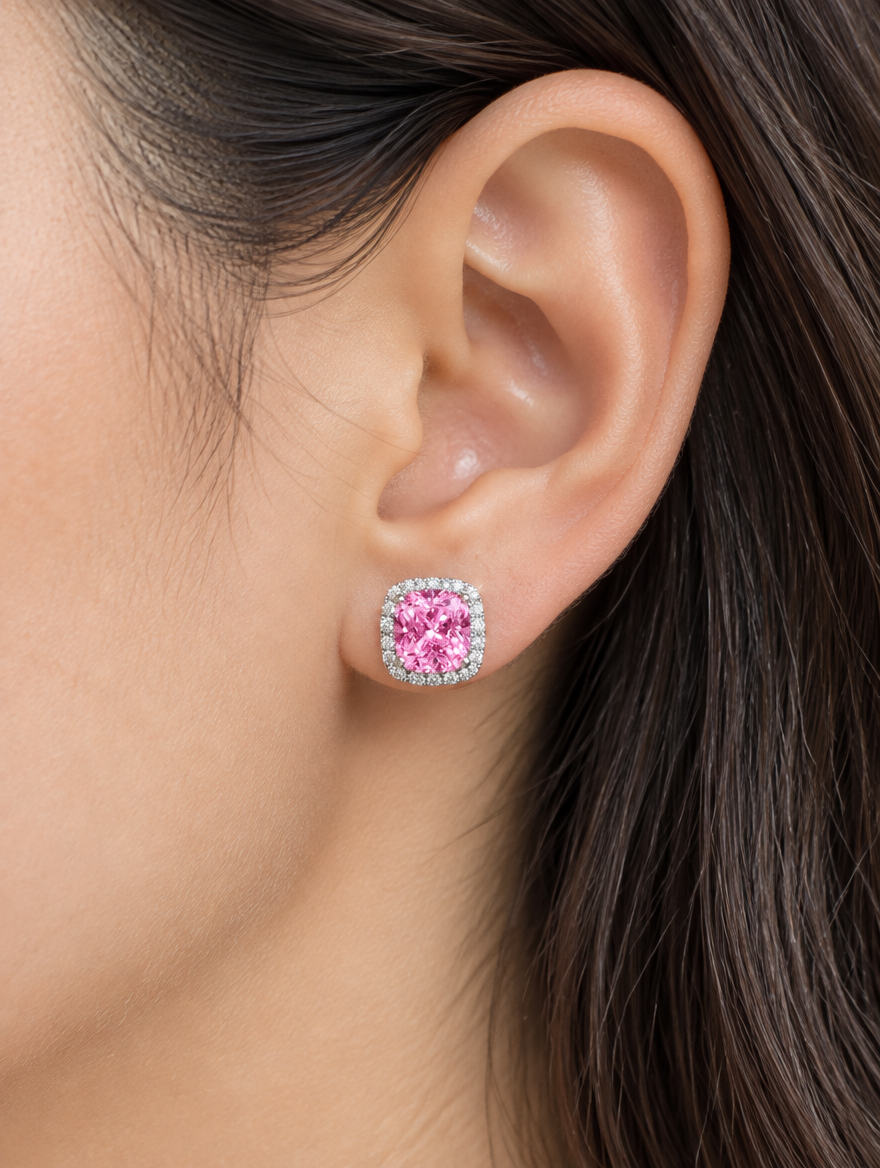 Woman wearing a pink halo cushion-cut cz stud earring