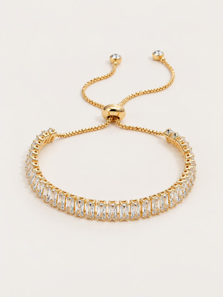 Gold baguette zircon tennis bracelet on a neutral background