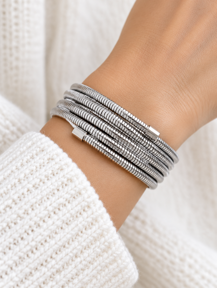 Woman wearing a silver multi-layer wrap bracelet