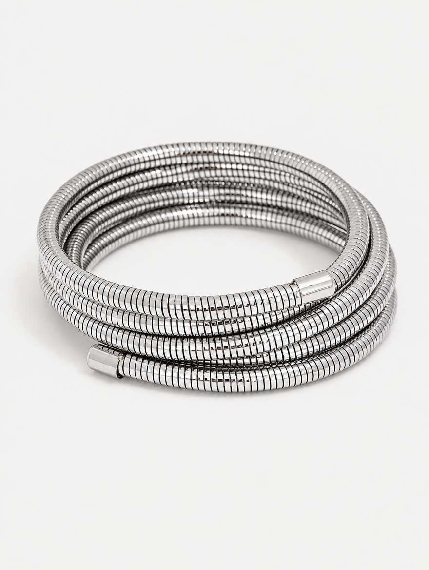 Silver multi-layer wrap bracelet on a neutral background
