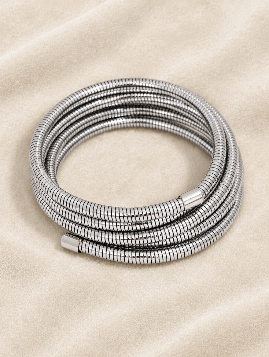 Silver wrap bracelet on cream velvet