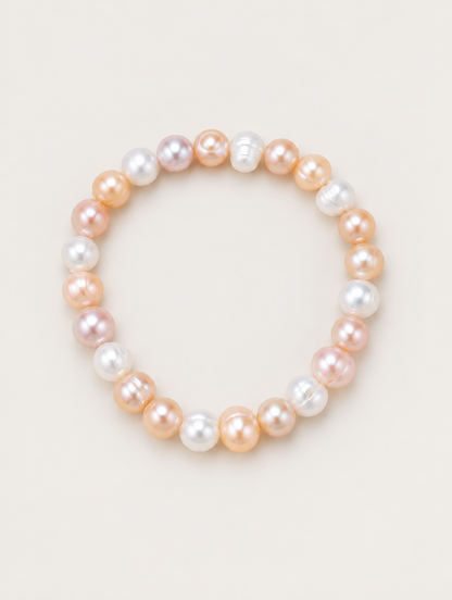 Mixed colour freshwater pearl bracelet on a neutral background