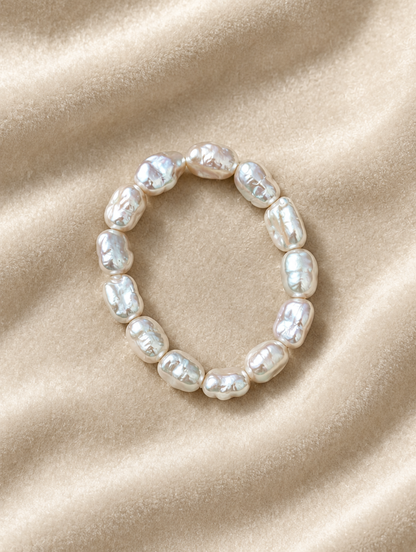 Baroque faux pearl bracelet on cream velvet