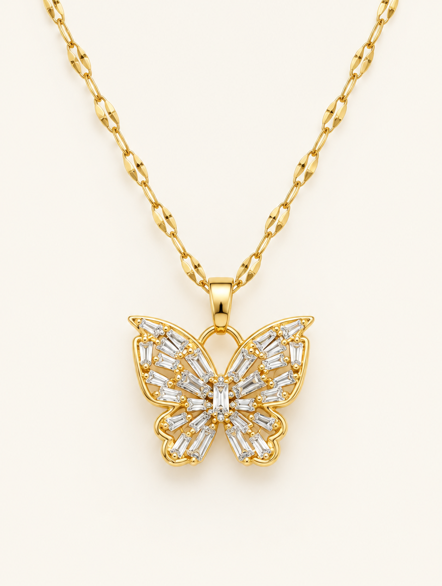 Gold necklace with an openwork butterfly set with clear crystals on a neutral background