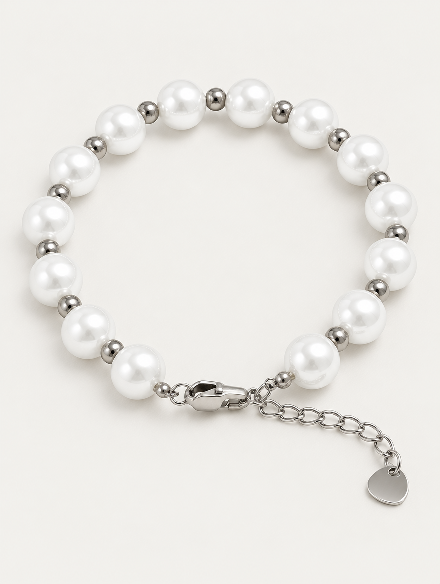Faux pearl bracelet with silver-tone beads on a neutral background